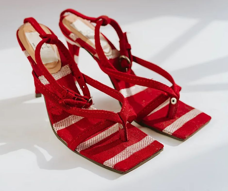 Gorgeous modern red heels to show the modern use of Aso Oke in fashion