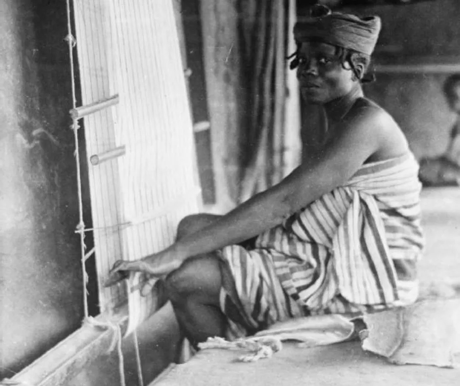 An African female aso oke weaver in the 19th Century using a single heddle loom, one of the earliest known photos of Aso Oke production. .